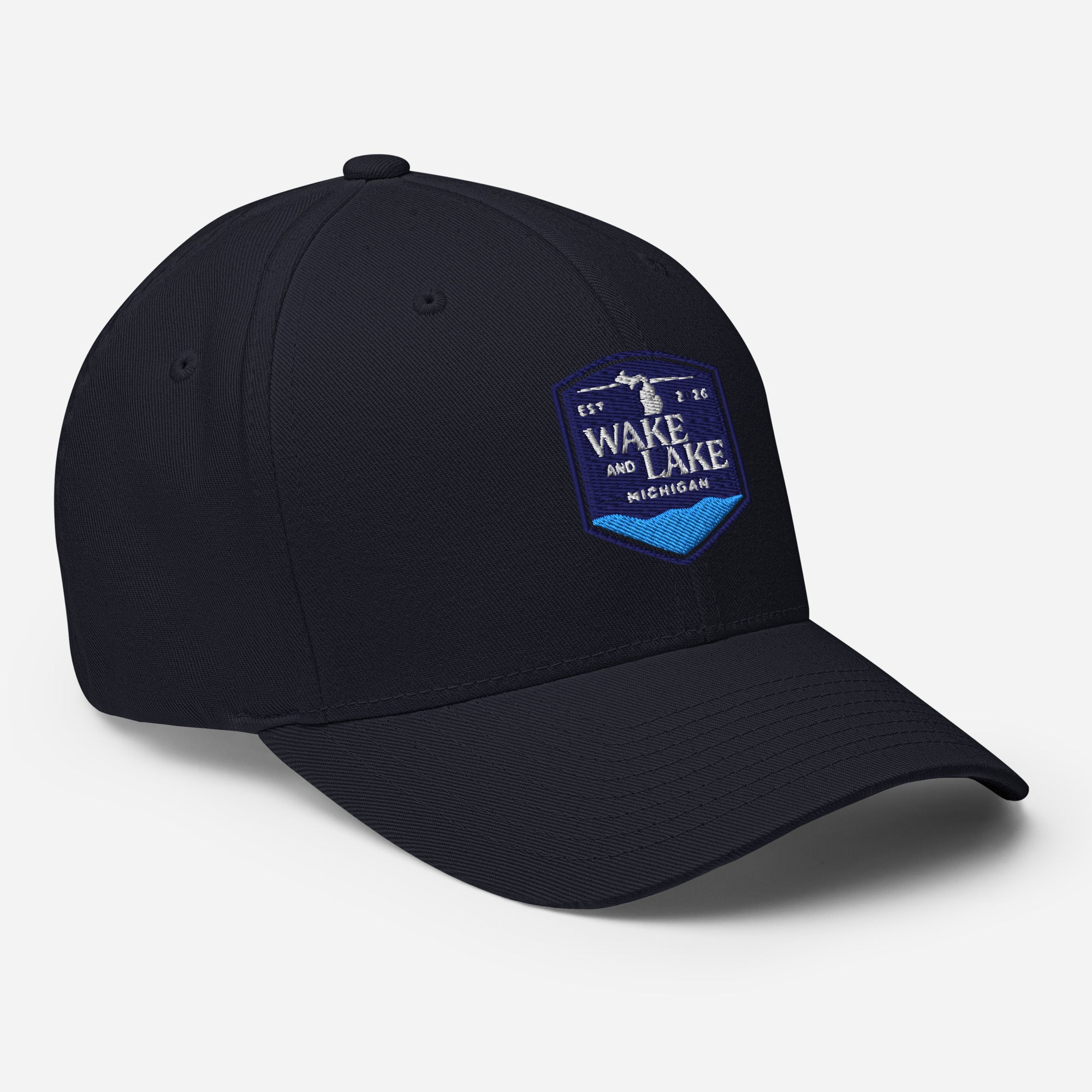 Wake and Lake Michigan Shield FlexFit Hat, Dark Navy with Coordinate badge on the front, and Circle Crest logo on the back, front view
