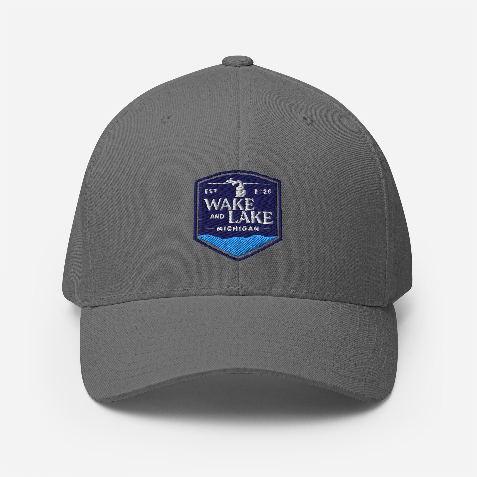 Wake and Lake Michigan Shield FlexFit Hat, grey with Coordinate badge on the front, and Circle Crest logo on the back, front view