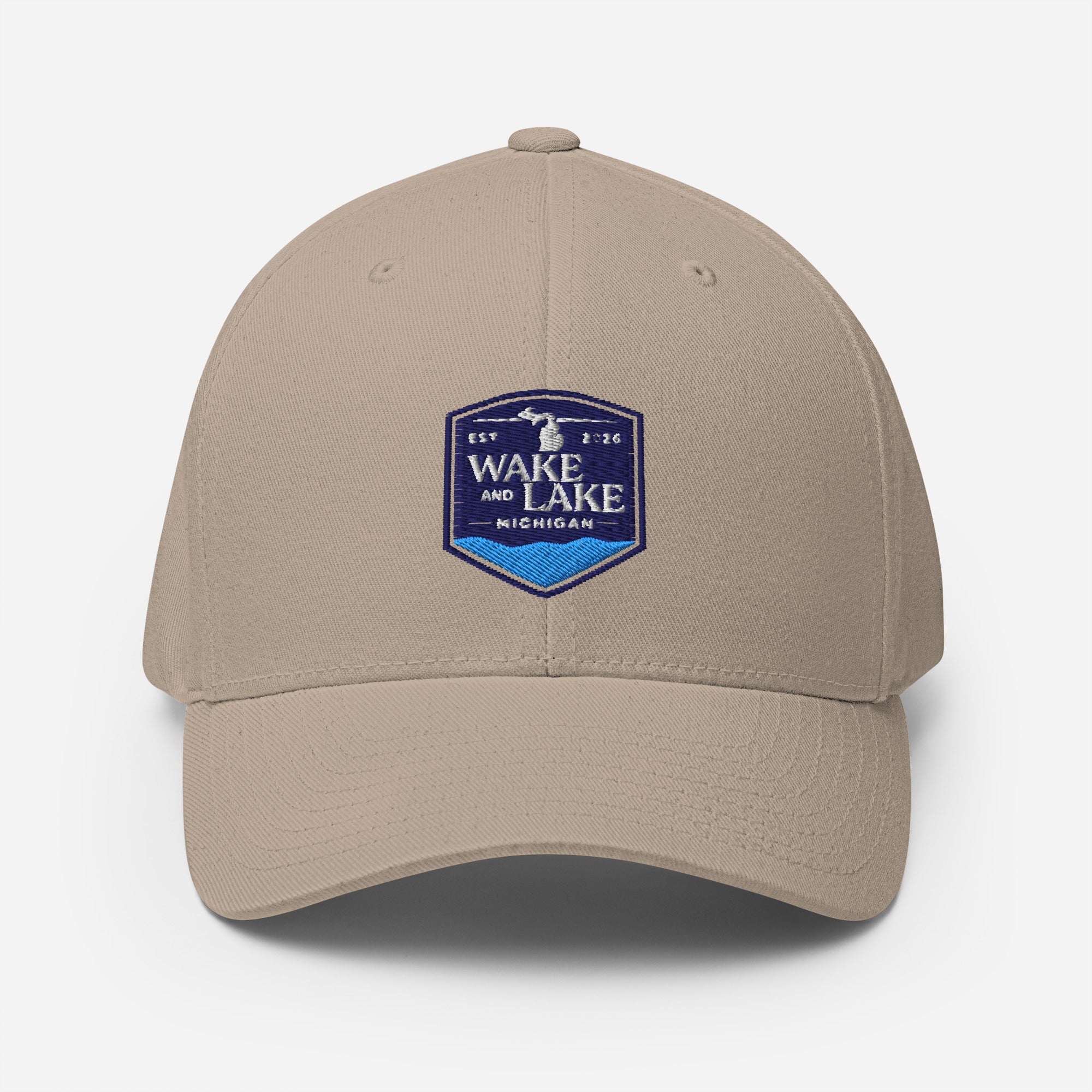 Wake and Lake Michigan Shield FlexFit Hat, khaki with Coordinate badge on the front, and Circle Crest logo on the back, front view