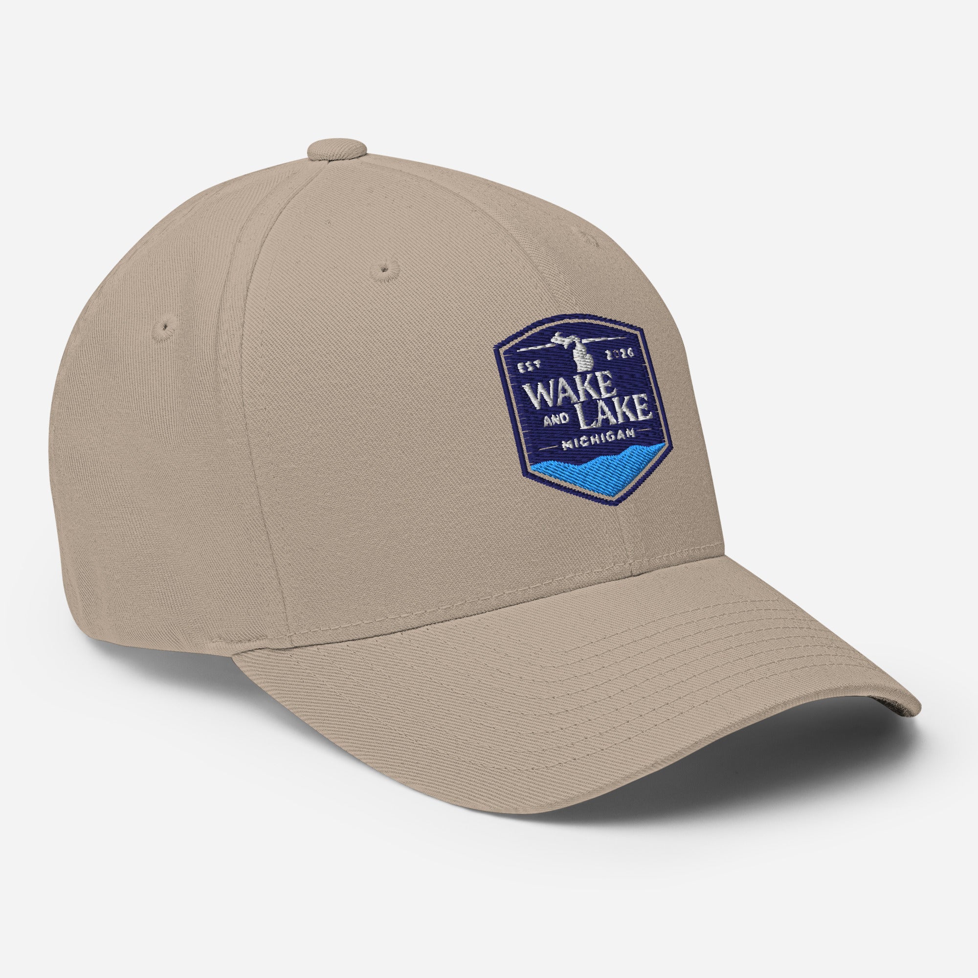 Wake and Lake Michigan Shield FlexFit Hat, khaki with Coordinate badge on the front, and Circle Crest logo on the back, front view