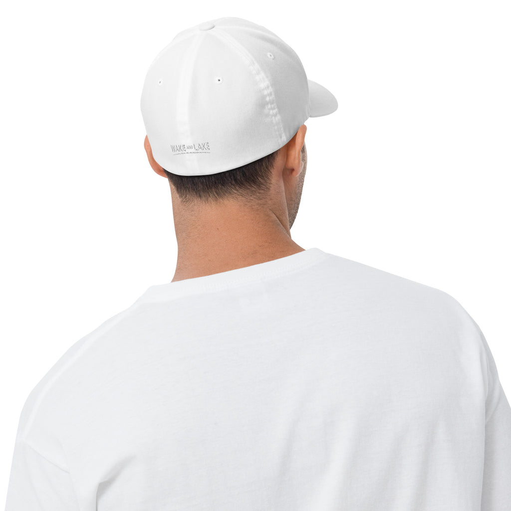 Wake and Lake Circle Crest FlexFit Hat worn on a sunny boat day
Fitted lake life hat with circle crest logo embroidery
Premium FlexFit boating cap with Wake and Lake branding
Structured fitted hat for lake days and outdoor summer wear
