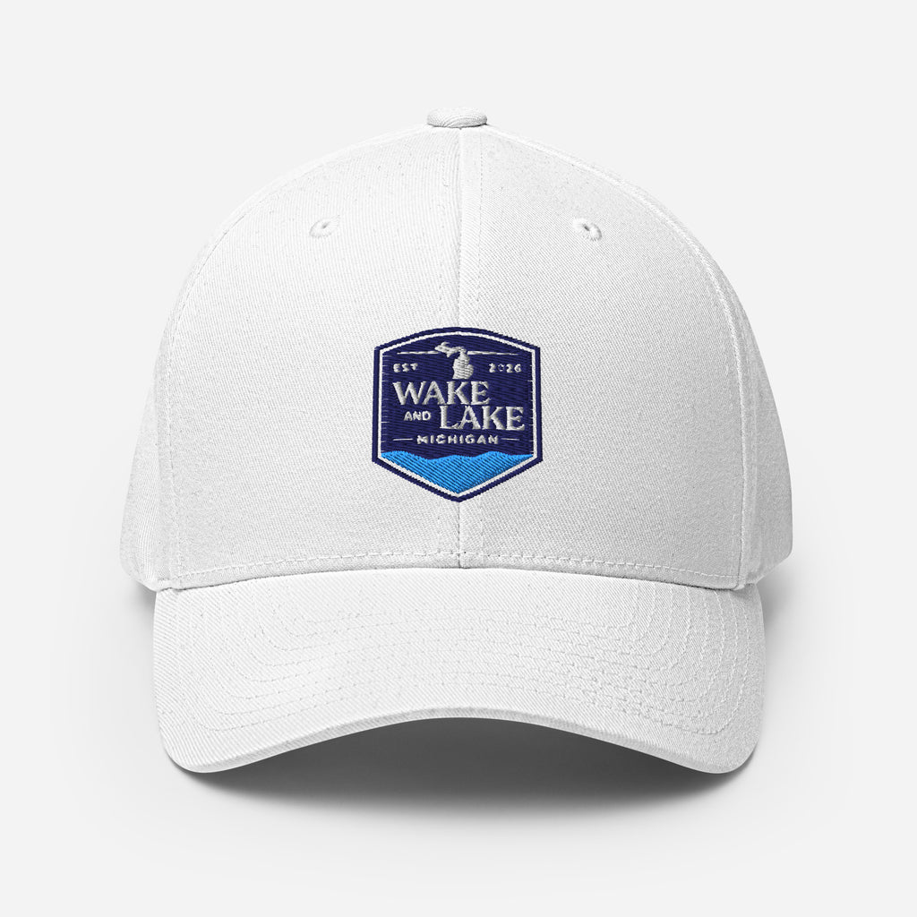 Wake and Lake Michigan Shield FlexFit Hat, White with Coordinate badge on the front, and Circle Crest logo on the back, front view