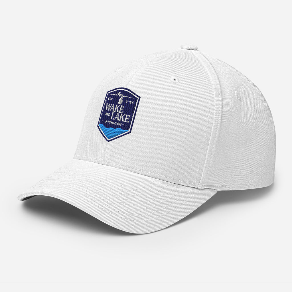 Wake and Lake Michigan Shield FlexFit Hat, White with Coordinate badge on the front, and Circle Crest logo on the back, front view